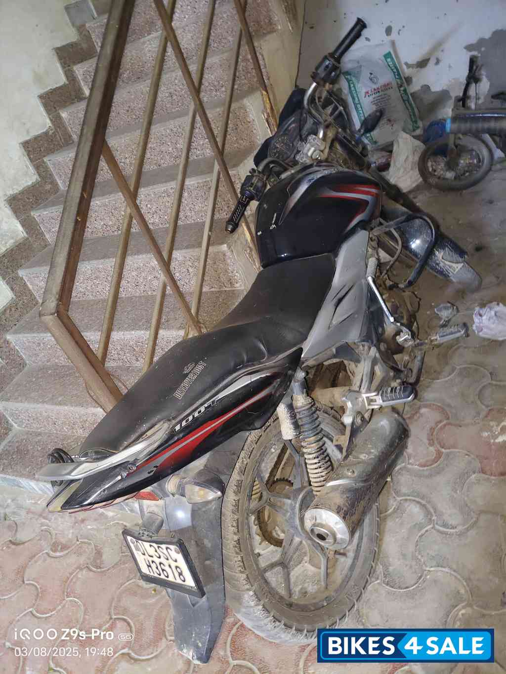 Red & Black Bajaj Discover 100T