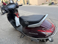Rebel Red Metallic Honda Activa 2025