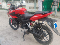 Red Bajaj Pulsar AS 150