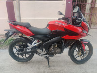 Red Bajaj Pulsar AS 150