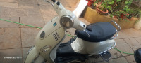 White Vespa LX 125