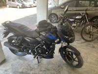 Black/blue Bajaj Pulsar 125