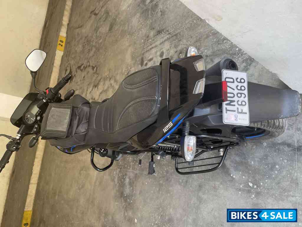 Black/blue Bajaj Pulsar 125