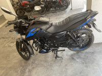 Black/blue Bajaj Pulsar 125