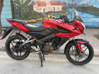 Red Bajaj Pulsar AS 150