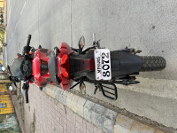 Red Bajaj Pulsar AS 150