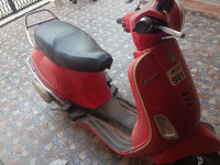 Red Vespa VXL 125