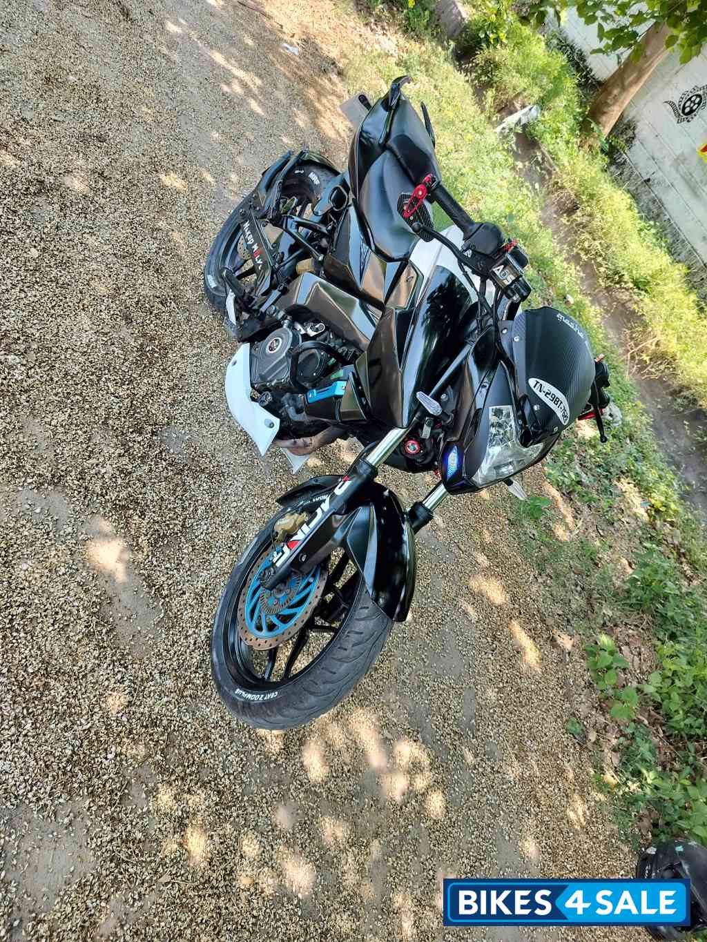 White And Black Bajaj Pulsar NS200