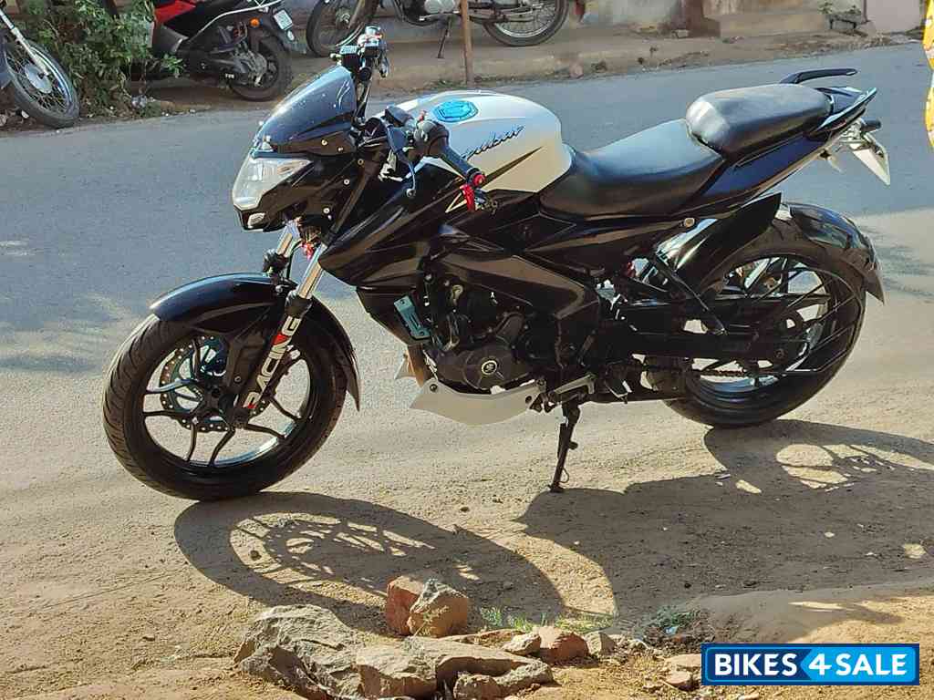 White And Black Bajaj Pulsar NS200
