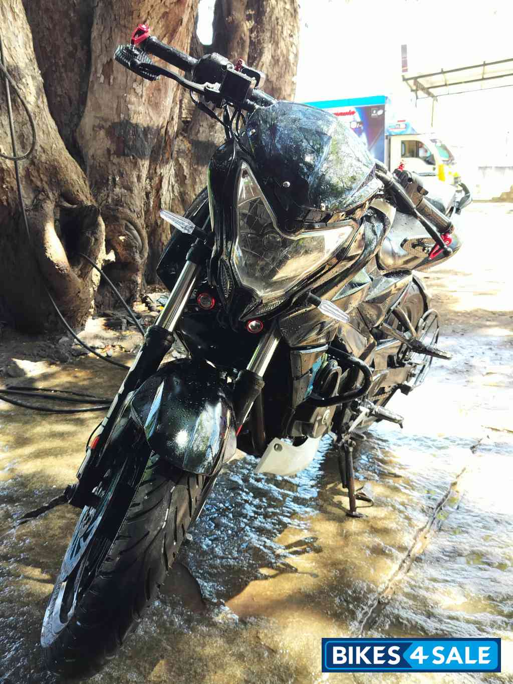 White And Black Bajaj Pulsar NS200