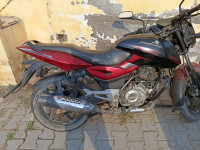 Red And Black Bajaj Pulsar 150 Twin Disc