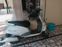 White Suzuki Access 125