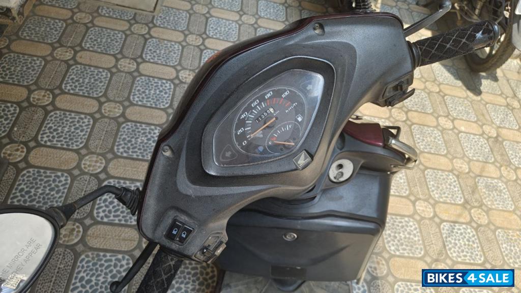 Maroon Honda Activa