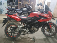 Red Bajaj Pulsar AS 150
