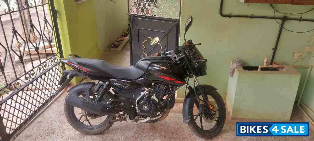 Black And Red Bajaj Pulsar 125