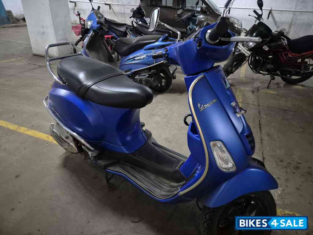 Blue Vespa SXL 125