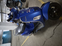 Blue Vespa SXL 125