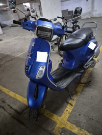 Blue Vespa SXL 125