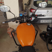 Orange Royal Enfield Thunderbird X 500