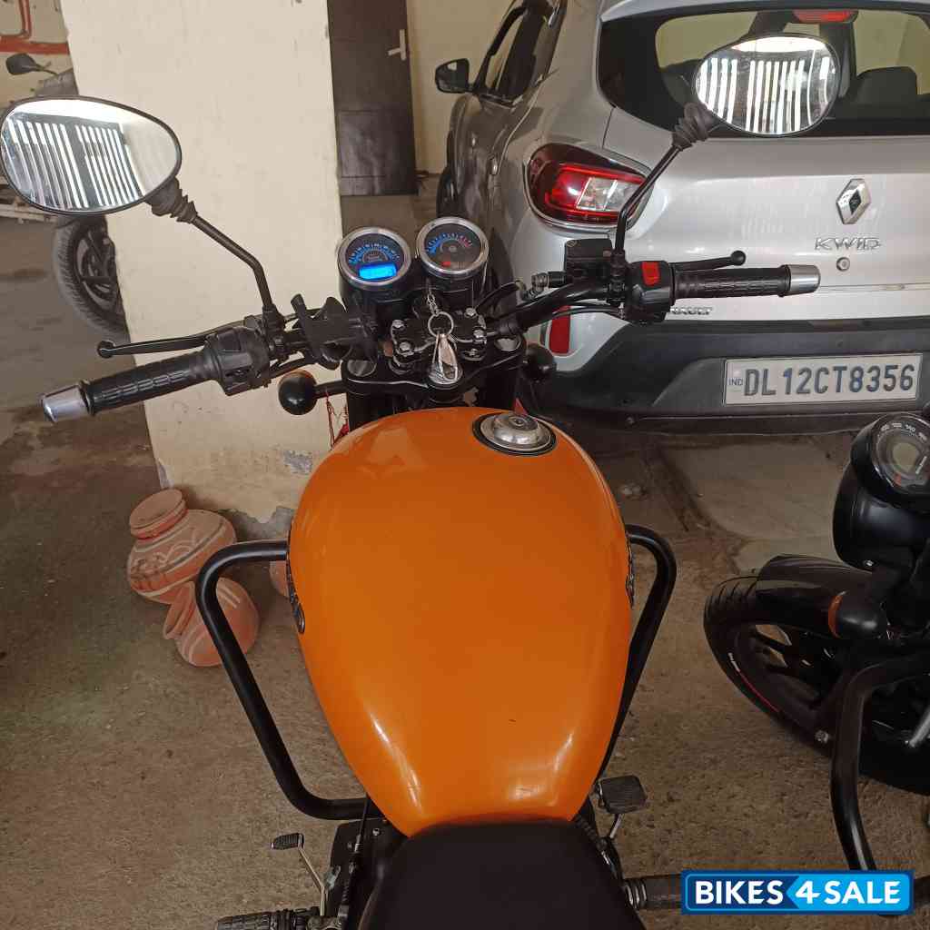 Orange Royal Enfield Thunderbird X 500