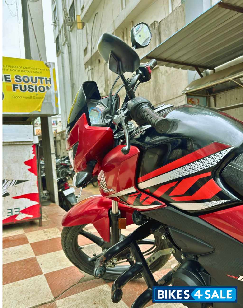 Black And Red Honda Livo Drum