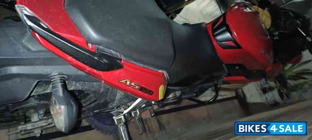 Red Bajaj Pulsar AS 150