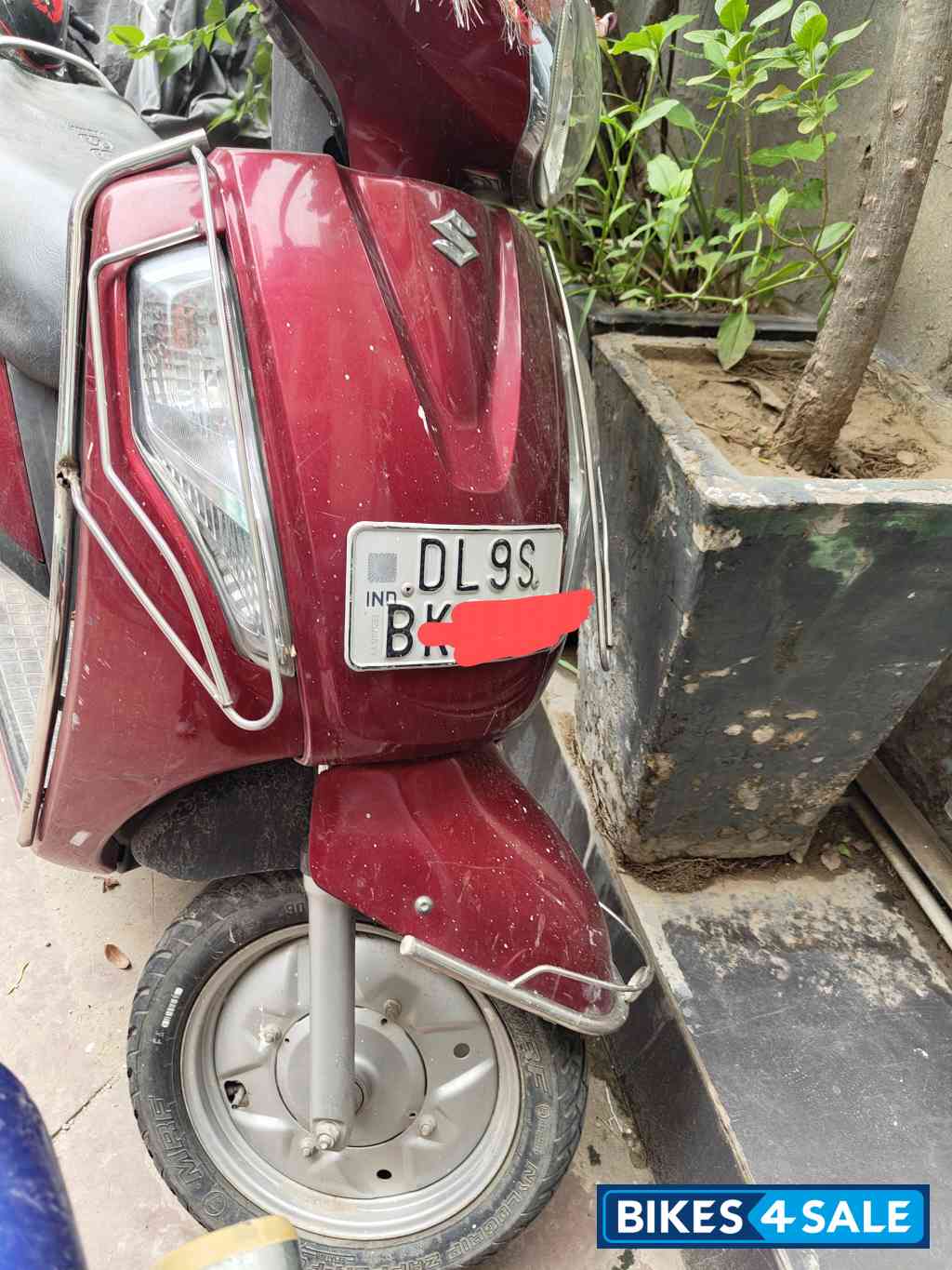 Red Suzuki Access 125