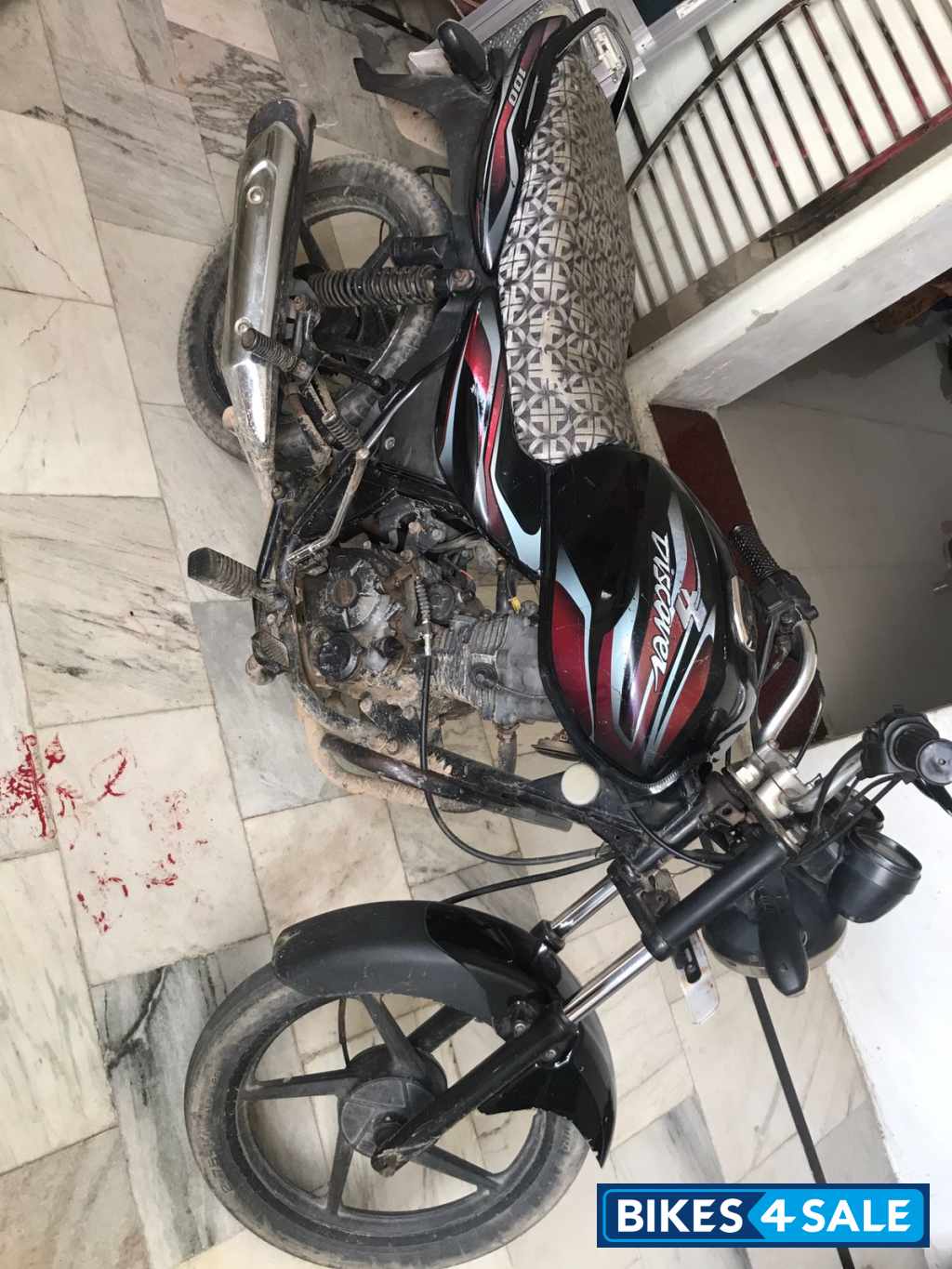 Red And Black Bajaj Discover 125