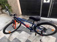 Blue And Orange Bicycle Decathlon