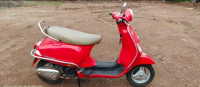 Red Vespa VX 125