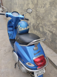 Assure Blue Vespa SXL 150