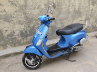 Assure Blue Vespa SXL 150