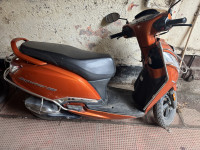 Orange TVS Jupiter 125