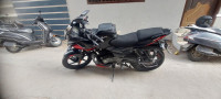Black And Red Bajaj Pulsar 220 DTSi