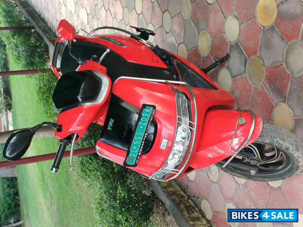 Red TVS iQube ST