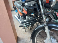 Orange Black Suzuki Samurai