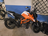 White & Orange KTM Duke 125
