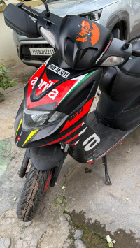 Black Aprilia SR 160 Race ABS