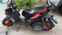 Black Aprilia SR 160 Race ABS