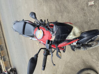 Red Bajaj Pulsar 135LS