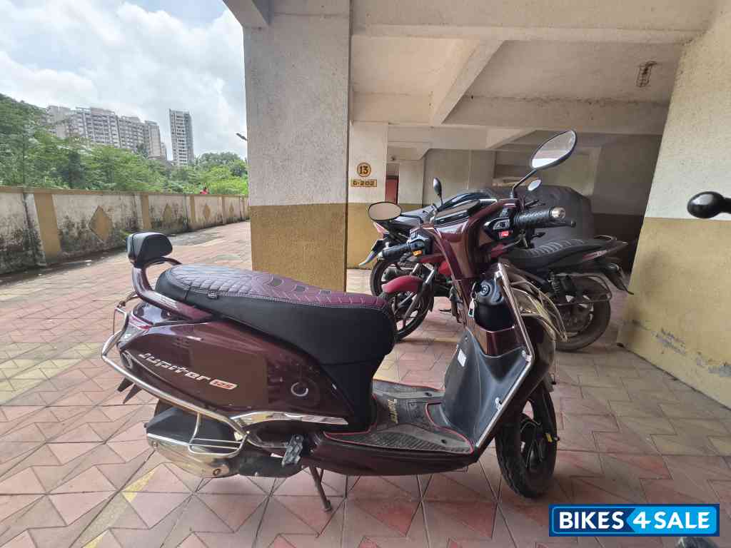 Maroon TVS Jupiter SmartXonnect Disc 2024