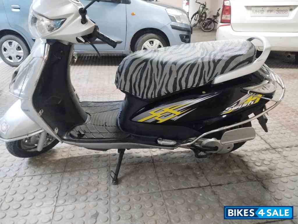 Silver/black Suzuki Swish