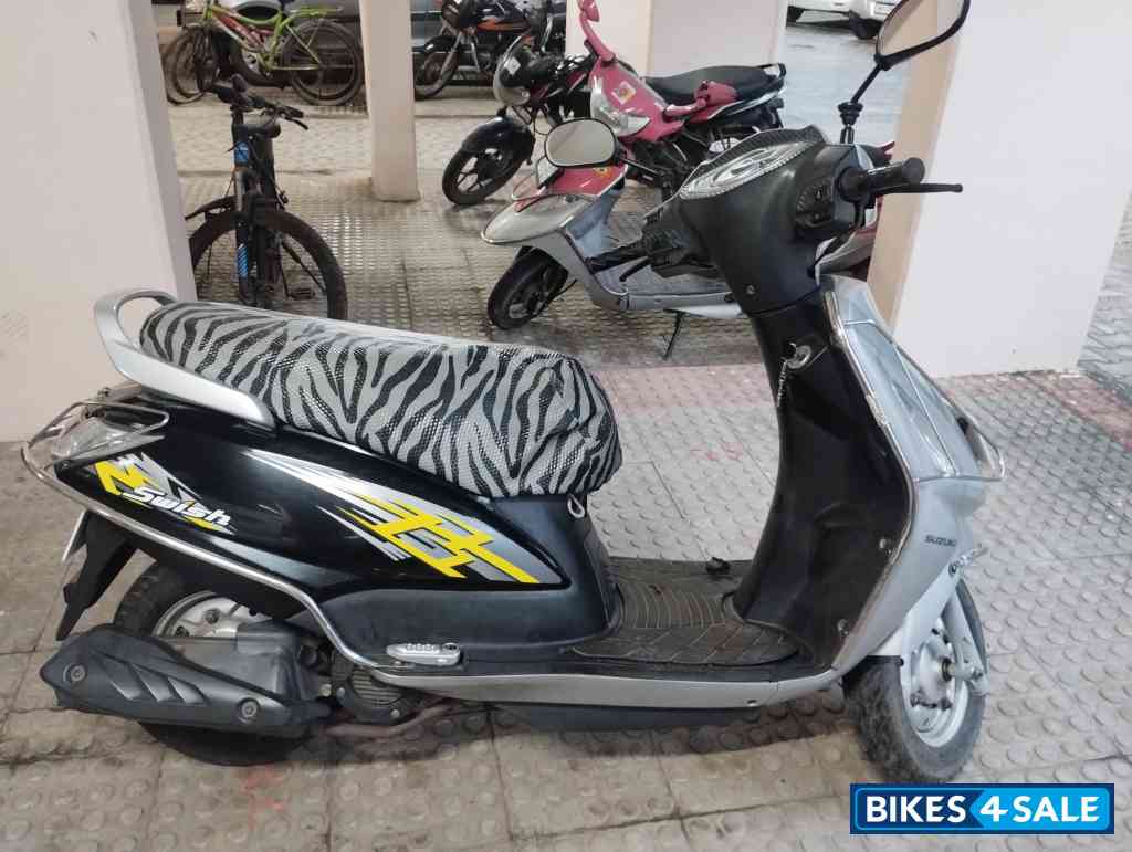 Silver/black Suzuki Swish
