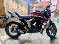 Candy Red/silver Suzuki Gixxer ABS