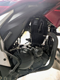 Candy Red/silver Suzuki Gixxer ABS