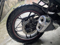 Candy Red/silver Suzuki Gixxer ABS