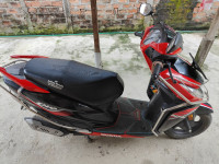 Red And Black Honda Dio 125