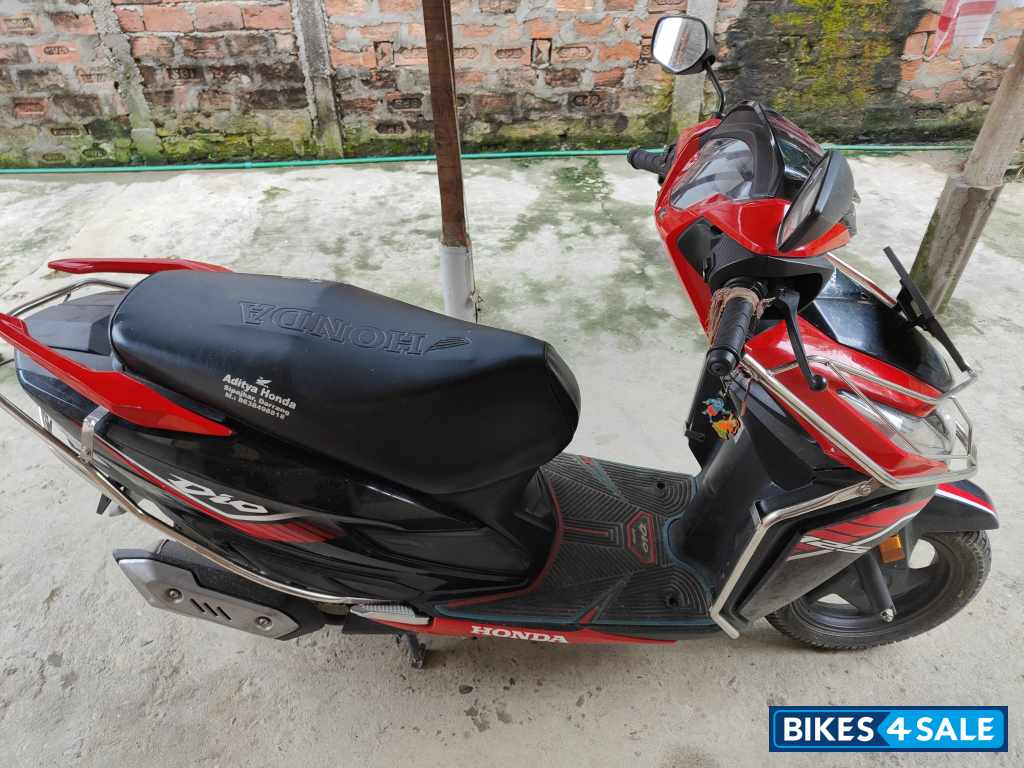 Red And Black Honda Dio 125