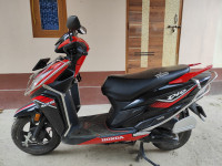 Red And Black Honda Dio 125