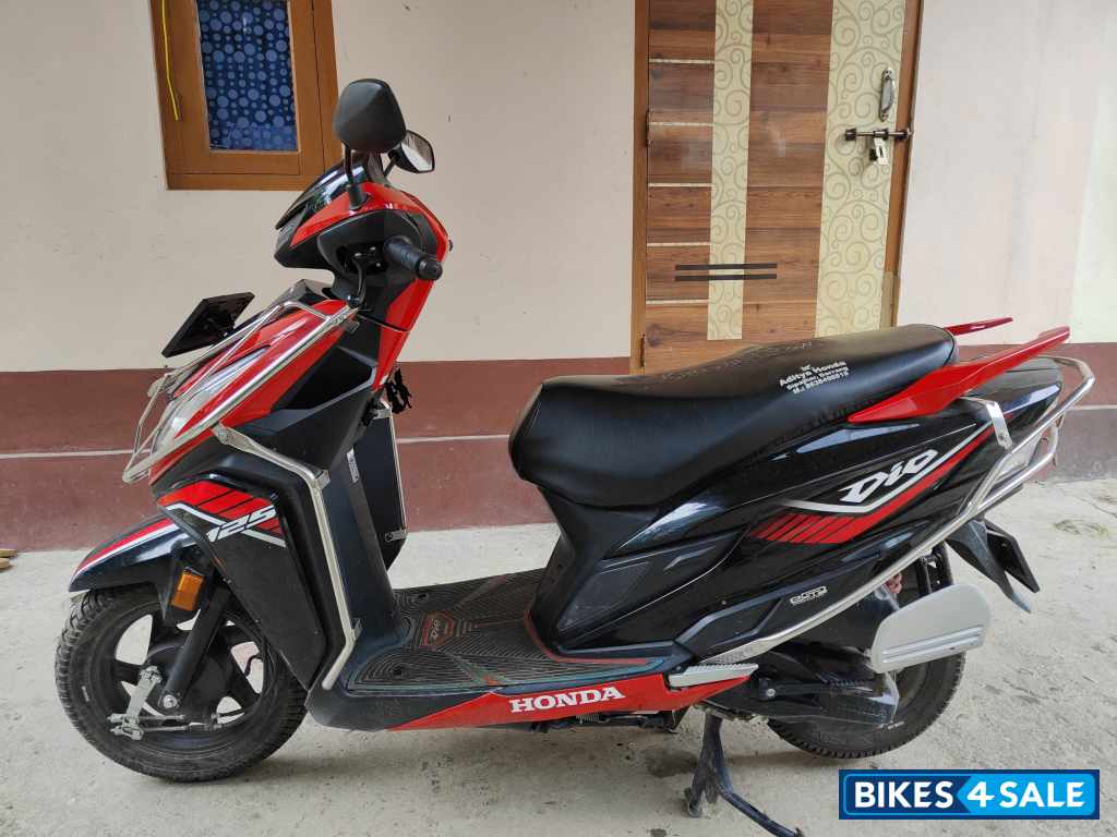 Red And Black Honda Dio 125